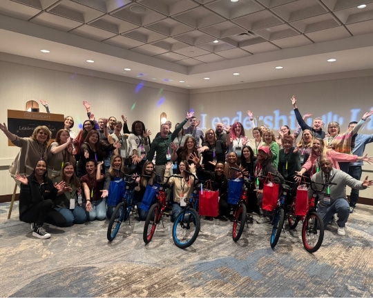 Concert Health Leadership Team Build Bikes For Charity in Las Vegas